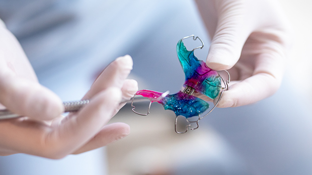 Michael-Riordan-DMD-adjusting-dental-orthodontic